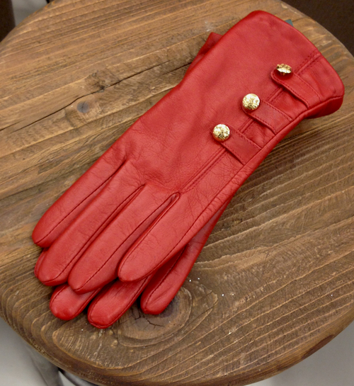 These Italian leather gloves with with shiny golden buttons are sure to please!